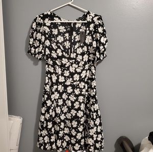 Pretty black and white floral dress with puff sleeves and a sweet heart neckline